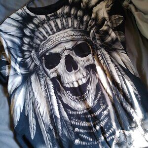 Large tee with native American design.